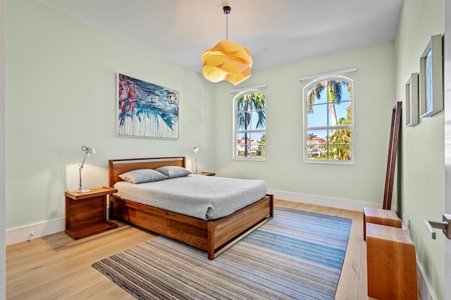 1583 Estuary Trl, Delray Beach, FL 33483 - bedroom featuring baseboards and light wood-type flooring