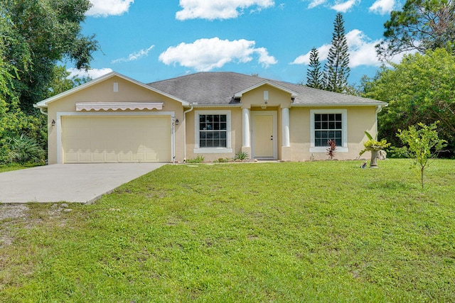 single story home with a front yard and a garage