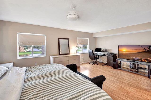 bedroom featuring light wood-type flooring