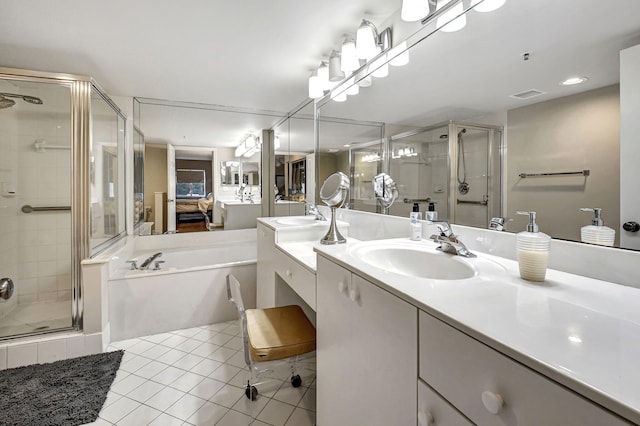 bathroom with vanity, separate shower and tub, and tile patterned floors