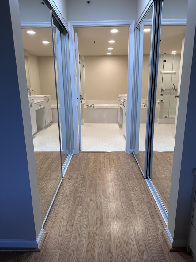 5777 Gemstone Ct Unit 304, Boynton Beach, FL 33437 - corridor featuring light wood-style flooring and recessed lighting