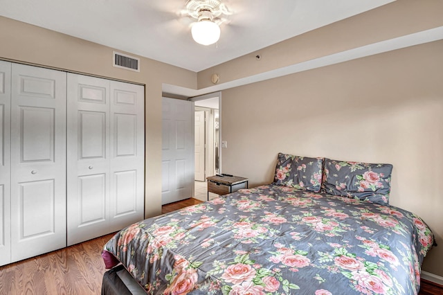 5777 Gemstone Ct Unit 304, Boynton Beach, FL 33437 - bedroom featuring wood finished floors, ceiling fan, and a closet