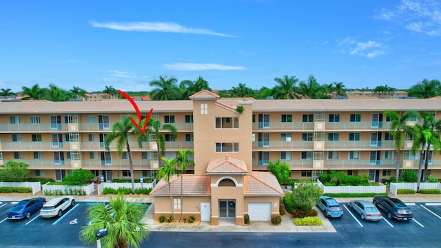 5777 Gemstone Ct Unit 304, Boynton Beach, FL 33437 - view of apartment building / complex with uncovered parking