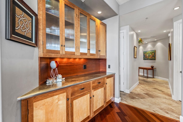 bar featuring dark hardwood / wood-style floors