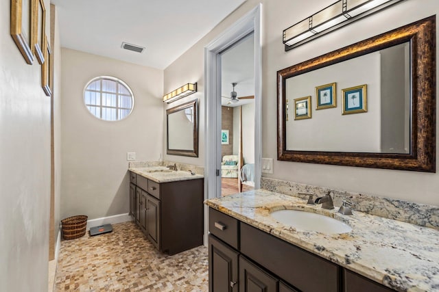 bathroom with vanity and ceiling fan