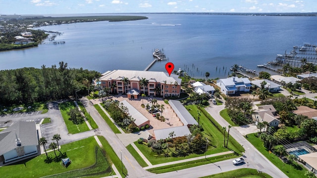 birds eye view of property featuring a water view