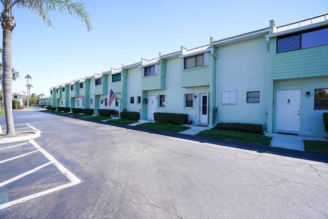 9427 S Ocean Dr Unit 60, Jensen Beach, FL 34957 - view of building exterior featuring a residential view