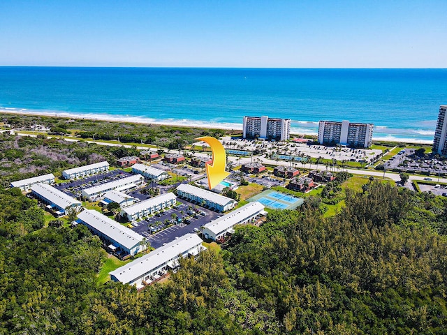 drone / aerial view with a view of the beach and a water view