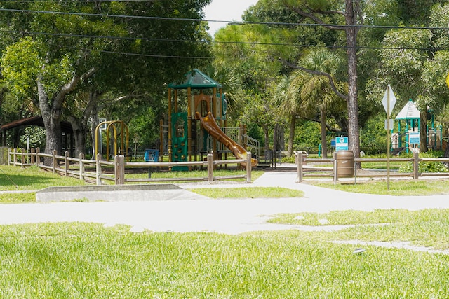 view of playground with a yard