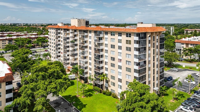 4174 Inverrary Dr Unit 914, Lauderhill, FL 33319 - view of apartment building / complex featuring uncovered parking and a view of city