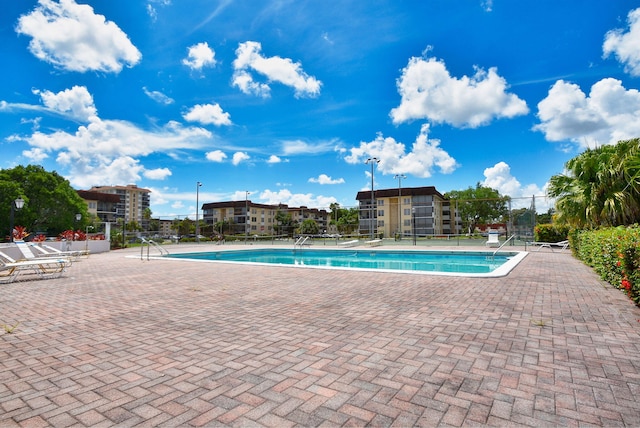 view of pool featuring a patio area