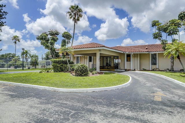 view of front of house with a front lawn