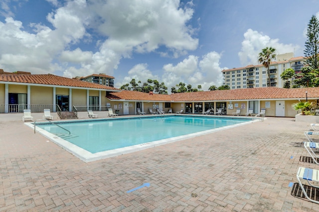 view of swimming pool featuring a patio