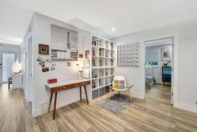 hallway featuring light hardwood / wood-style flooring