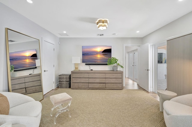 bedroom with light hardwood / wood-style floors