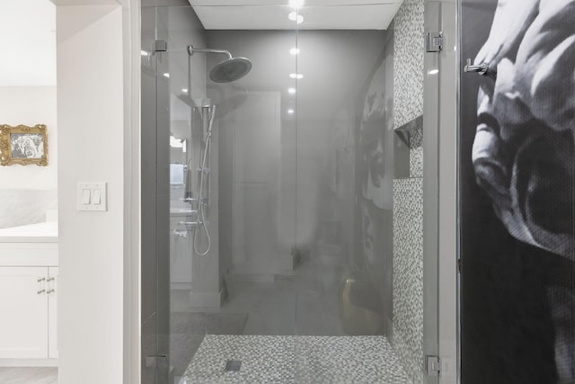 bathroom with vanity, tile patterned flooring, and an enclosed shower