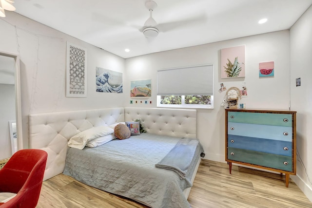 bedroom featuring wood-type flooring and ceiling fan