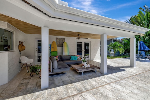 view of patio / terrace with ceiling fan and french doors