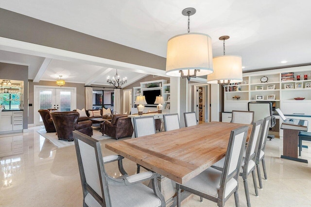 dining space with a chandelier, french doors, lofted ceiling with beams, and built in features