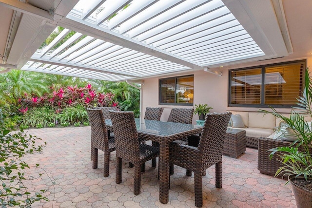 view of patio with outdoor lounge area and a pergola