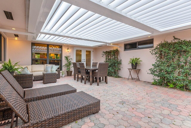 view of patio / terrace featuring a pergola, french doors, and an outdoor hangout area