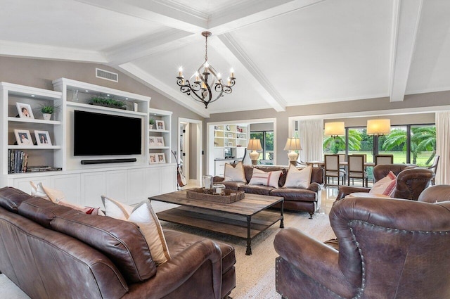 living room with vaulted ceiling with beams, a healthy amount of sunlight, and a notable chandelier