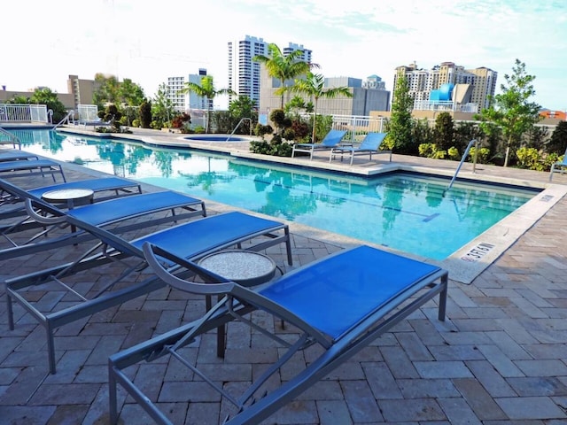 view of pool featuring a patio