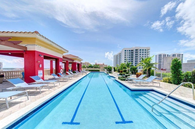 view of swimming pool with a patio area