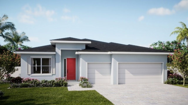 prairie-style house with a garage and a front lawn