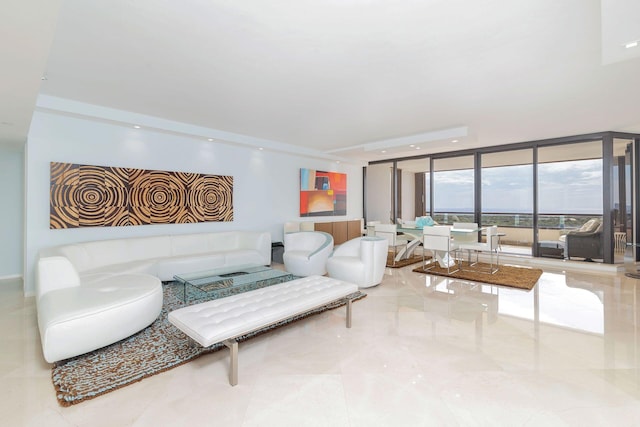 living room with floor to ceiling windows