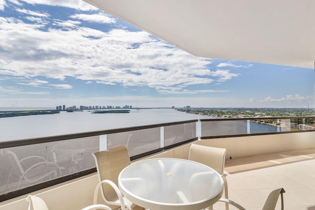 balcony featuring a water view