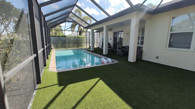 view of pool featuring a patio, a lanai, and a yard