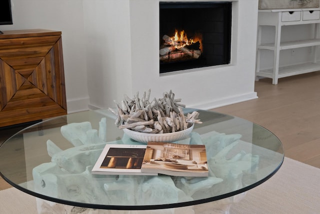 dining space with hardwood / wood-style flooring