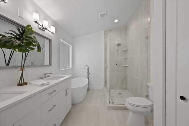 full bathroom featuring plus walk in shower, tile patterned flooring, lofted ceiling, vanity, and toilet