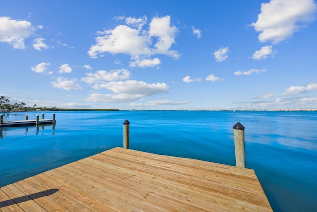 view of dock with a water view