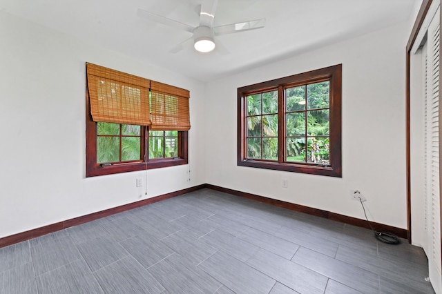 empty room featuring ceiling fan