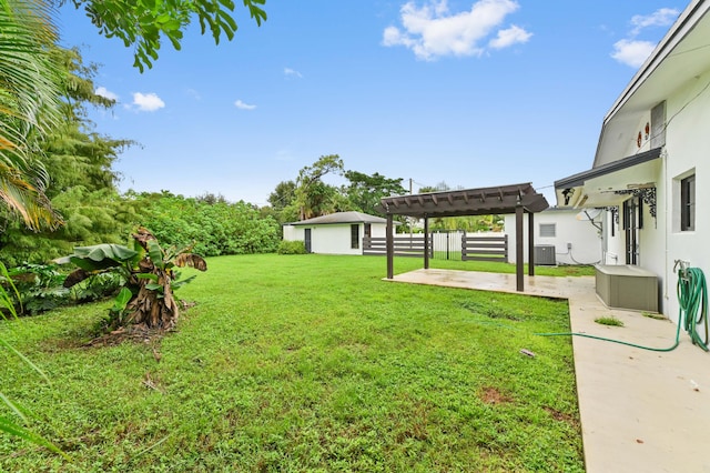 view of yard with central AC unit, a pergola, and a patio