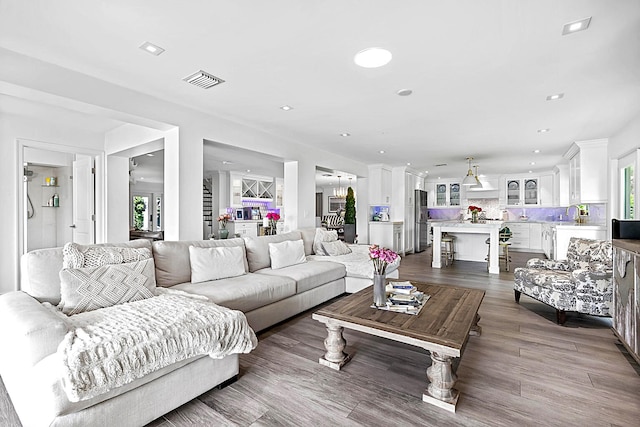 living room with hardwood / wood-style flooring