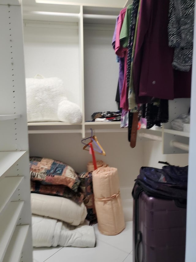 walk in closet featuring tile patterned floors