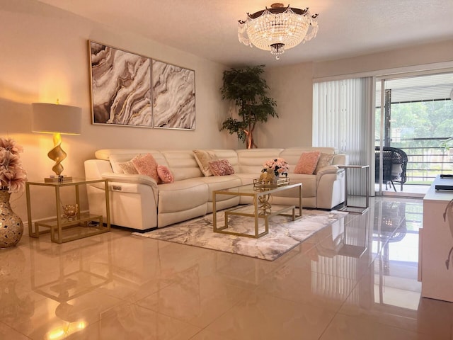 living room with tile patterned floors and a chandelier