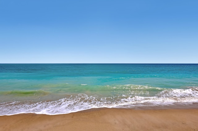 property view of water with a beach view