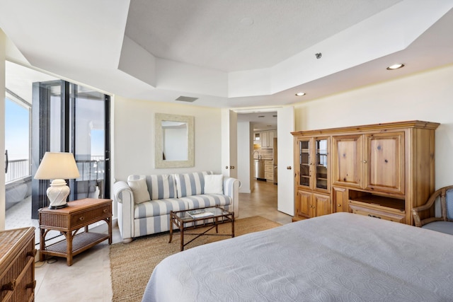 bedroom featuring a tray ceiling