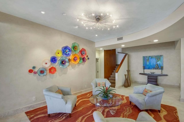 living room with a chandelier