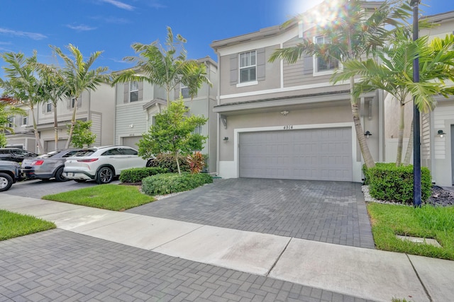 view of front of home with a garage