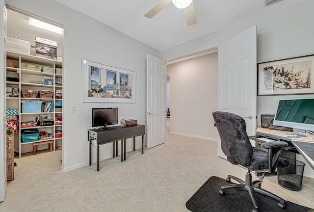 office area featuring light tile patterned floors and ceiling fan