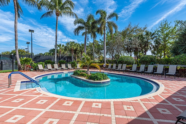 view of pool featuring a patio area