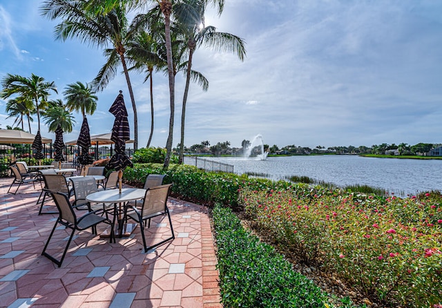 view of patio featuring a water view