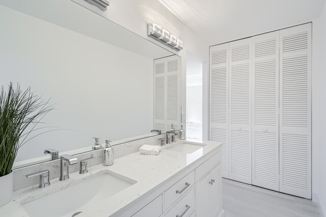 bathroom with a shower with door and toilet