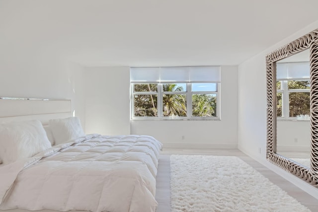 bedroom with light hardwood / wood-style flooring