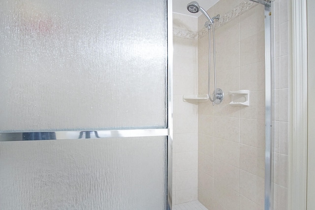 bathroom featuring an enclosed shower